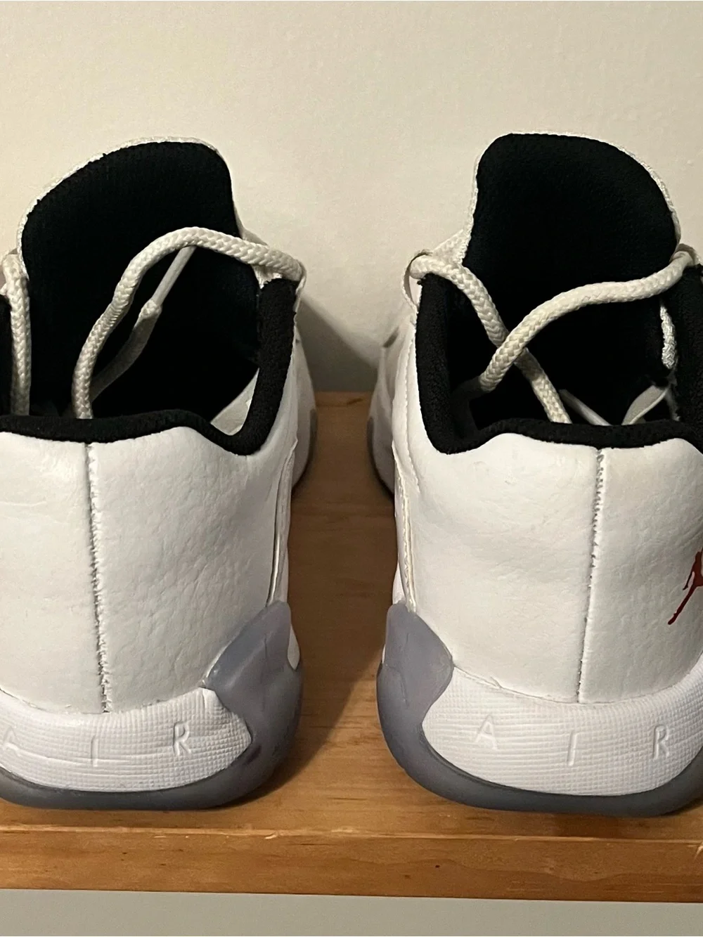 Jordan Kids White Sneakers with Red Jumpman Accent